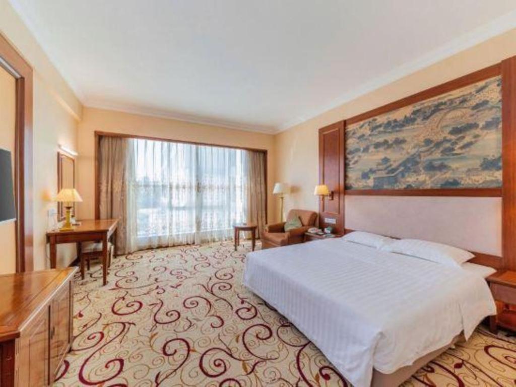 Fenggang Gladden Hotel Tiantangwei Exterior photo