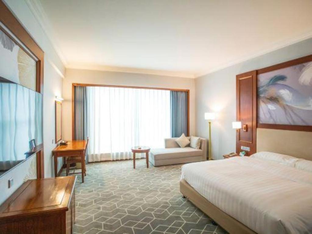 Fenggang Gladden Hotel Tiantangwei Exterior photo