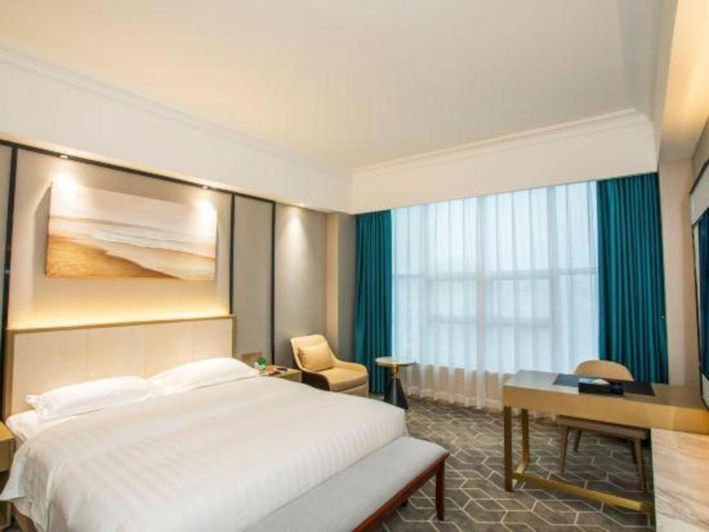 Fenggang Gladden Hotel Tiantangwei Exterior photo