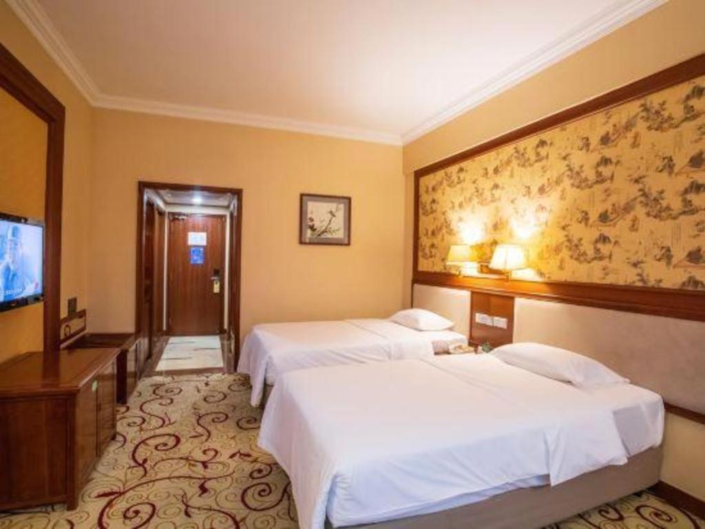Fenggang Gladden Hotel Tiantangwei Exterior photo