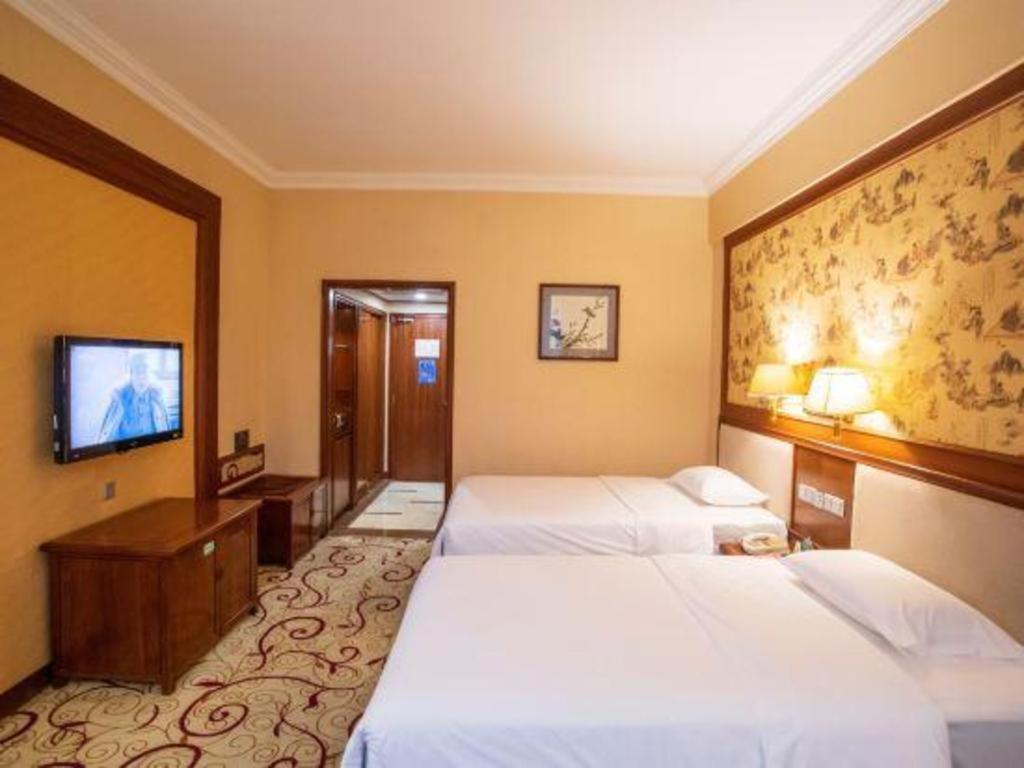 Fenggang Gladden Hotel Tiantangwei Exterior photo