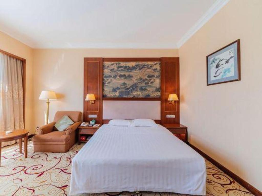Fenggang Gladden Hotel Tiantangwei Exterior photo